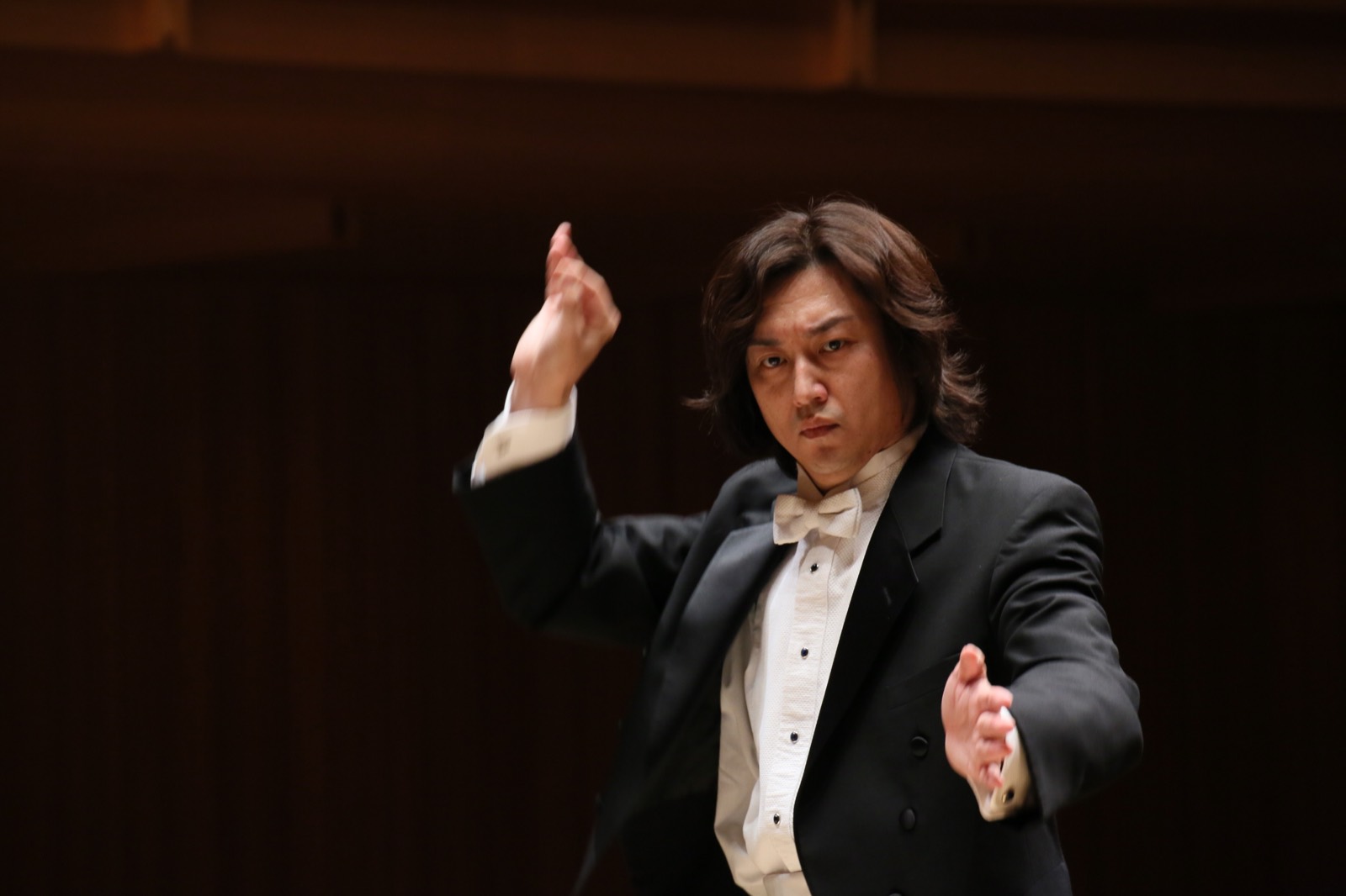 Shizuo Z Kuwahara conducting